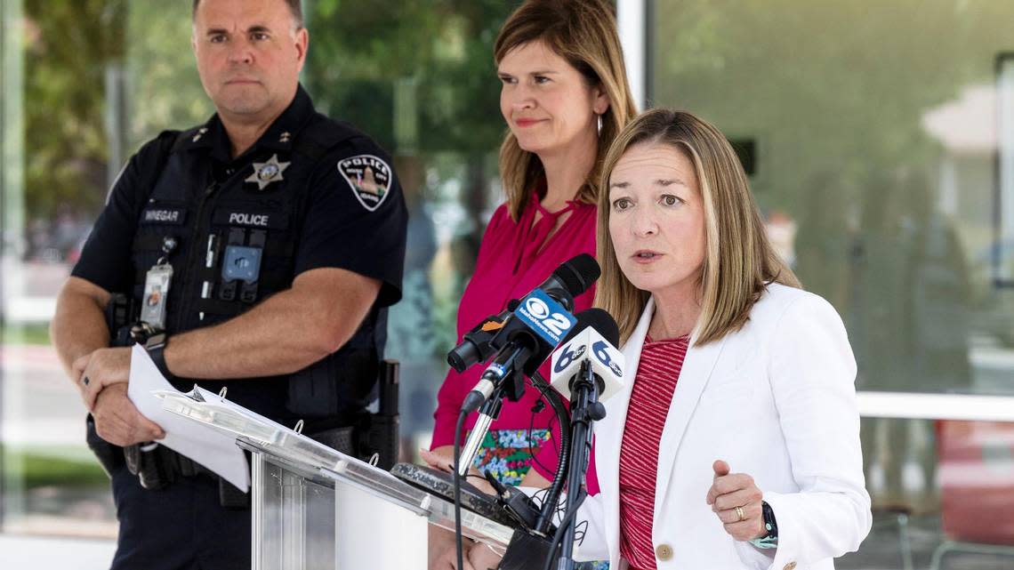 McLean, Police Chief Ron Winegar and City Council Member Luci Willits join other civic leaders at an August news conference to address a string of pedestrian deaths in crosswalks this summer.
