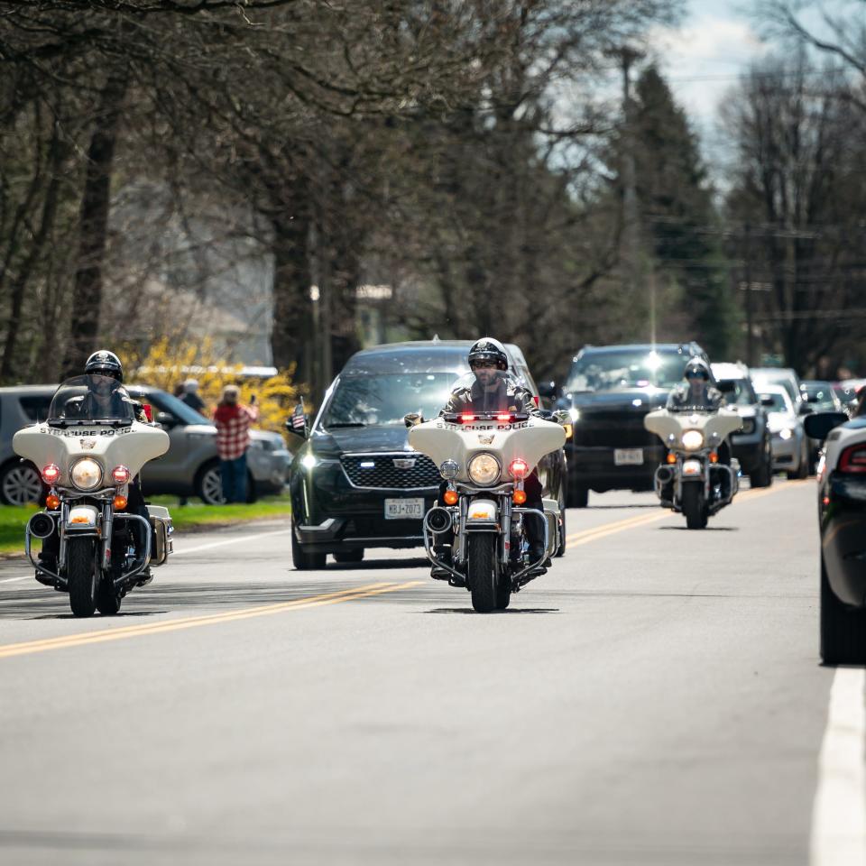 A motorcade of law enforcement drives along Turin Road in Rome, NY for fallen Syracuse Police Officer Michael Jensen on Tuesday, April 16, 2024.