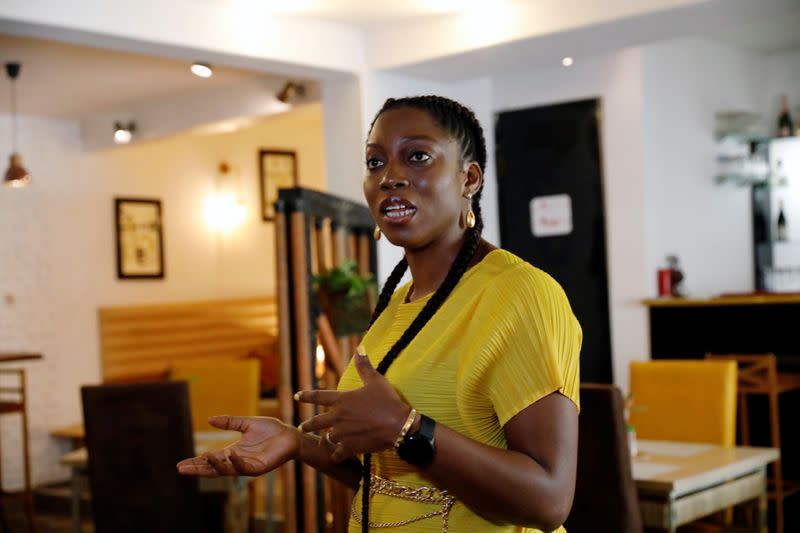 Tina Shaire, head chef at Zolene Restaurant speaks during an interview with Reuters at her restaurant in Lagos