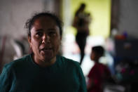 FILE - Iracema Figueroa, left, of Honduras, looks on at a shelter for migrants, May 20, 2022, in Tijuana, Mexico. The Supreme Court has ruled that the Biden administration properly ended a Trump-era policy forcing some U.S. asylum-seekers to wait in Mexico. The justices’ 5-4 decision for the administration came in a case about the “Remain in Mexico” policy under President Donald Trump. (AP Photo/Gregory Bull, File)