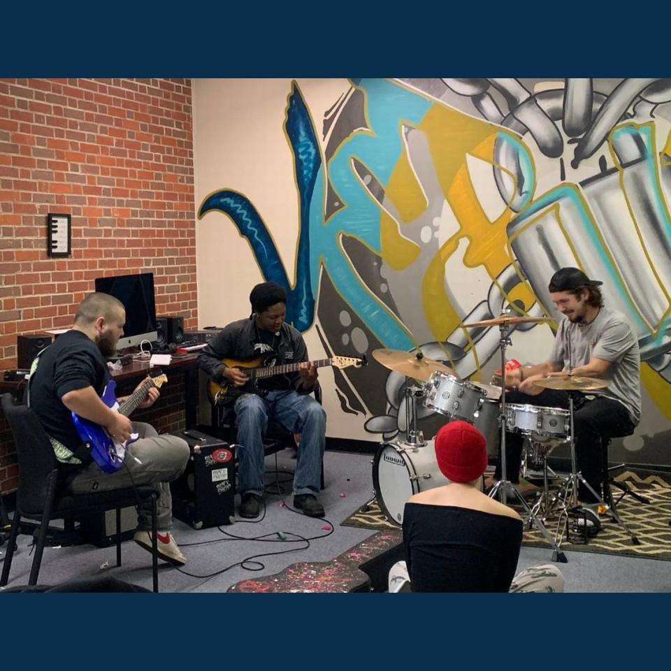 Student learn to play guitar and drums at Charlotte’s Emerald School of Excellence, one of two recovery schools in North Carolina and about 40 in the country.