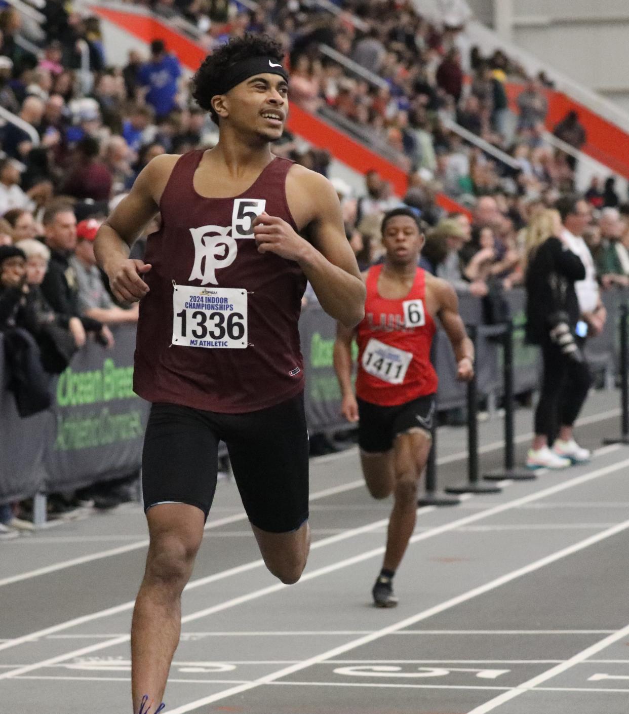 Jaylin Santiago from Fordham Prep competes in the boys 300 meter dash at the 2024 New York State Indoor Track and Field Championships at the Ocean Breeze Athletic Complex in Staten Island, March 2, 2024.