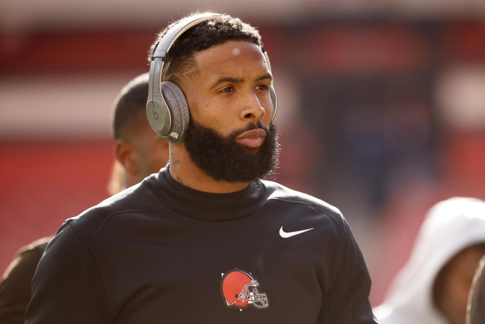 Cleveland Browns wide receiver Odell Beckham Jr. (13) walks off of the field prior to the start of an NFL football game against the Pittsburgh Steelers, Sunday, Oct. 31, 2021, in Cleveland. The star wide receiver was excused from practice on Wednesday, Nov. 3, a day after his father caused a stir before the trade deadline by sharing a video of quarterback Baker Mayfield not throwing passes to his son. (AP Photo/Kirk Irwin)