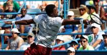 Jul 24, 2016; Washington, DC, USA; Gael Monfils of France leaps to reach a backhand against Ivo Karlovic of Croatia (not pictured) in the men's singles final of the Citi Open at Rock Creek Park Tennis Center. Monfils won 5-7, 7-6(6), 6-4. Mandatory Credit: Geoff Burke-USA TODAY Sports