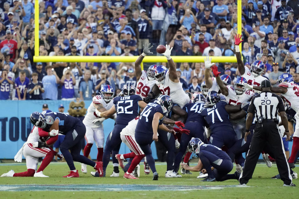 Tennessee Titans place kicker Randy Bullock (14) misses a field goal during the second half of an NFL football game against the New York Giants Sunday, Sept. 11, 2022, in Nashville. The Giants won 21-20.(AP Photo/Mark Humphrey)