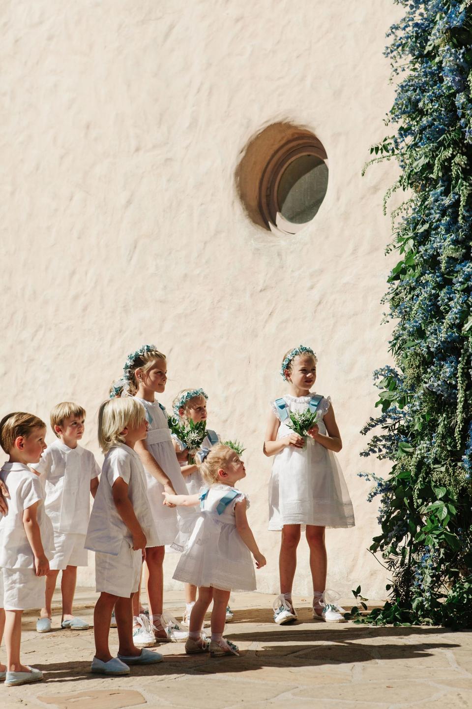 The bride combined California cool with English tradition, wore two Carolina Herrera dresses, and drove off in a vintage Porsche.