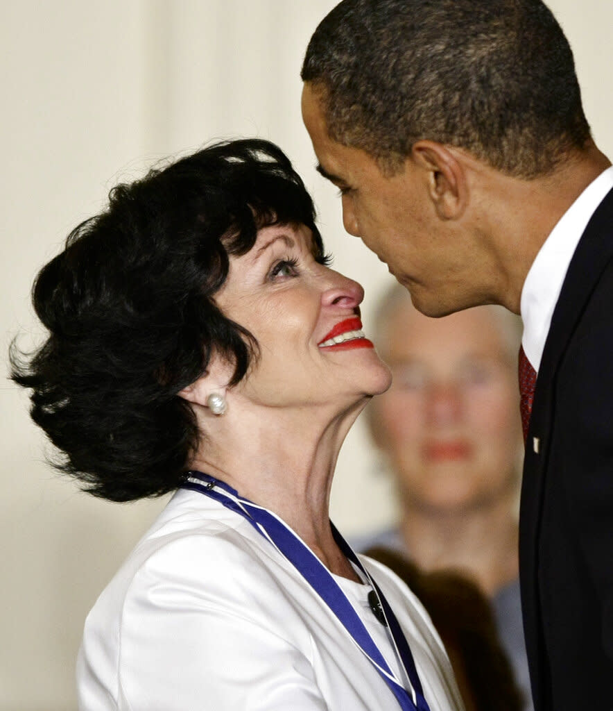 President Barack Obama presents the 2009 Presidential Medal of Freedom to Chita Rivera, who, as a Puerto Rican-American, broke barriers as an actress, singer and dancer to become a Broadway star in West Side Story and was the first Hispanic woman to receive a Kennedy Center Honors award, during ceremonies at the White House in Washington, Wednesday, Aug. 12, 2009. (AP Photo/J. Scott Applewhite)