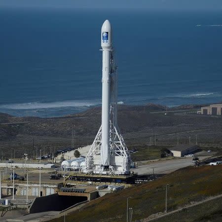 A SpaceX Falcon 9 rocket with the Jason-3 spacecraft onboard is shown at Vandenberg Air Force Base Space Launch Complex 4 East in Vandenberg Air Force Base, California, January 16, 2016. REUTERS/Gene Blevins