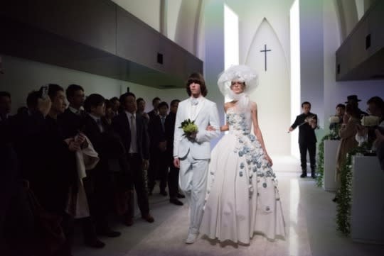 The bride and groom walking down the aisle. (Photo: Courtesy)