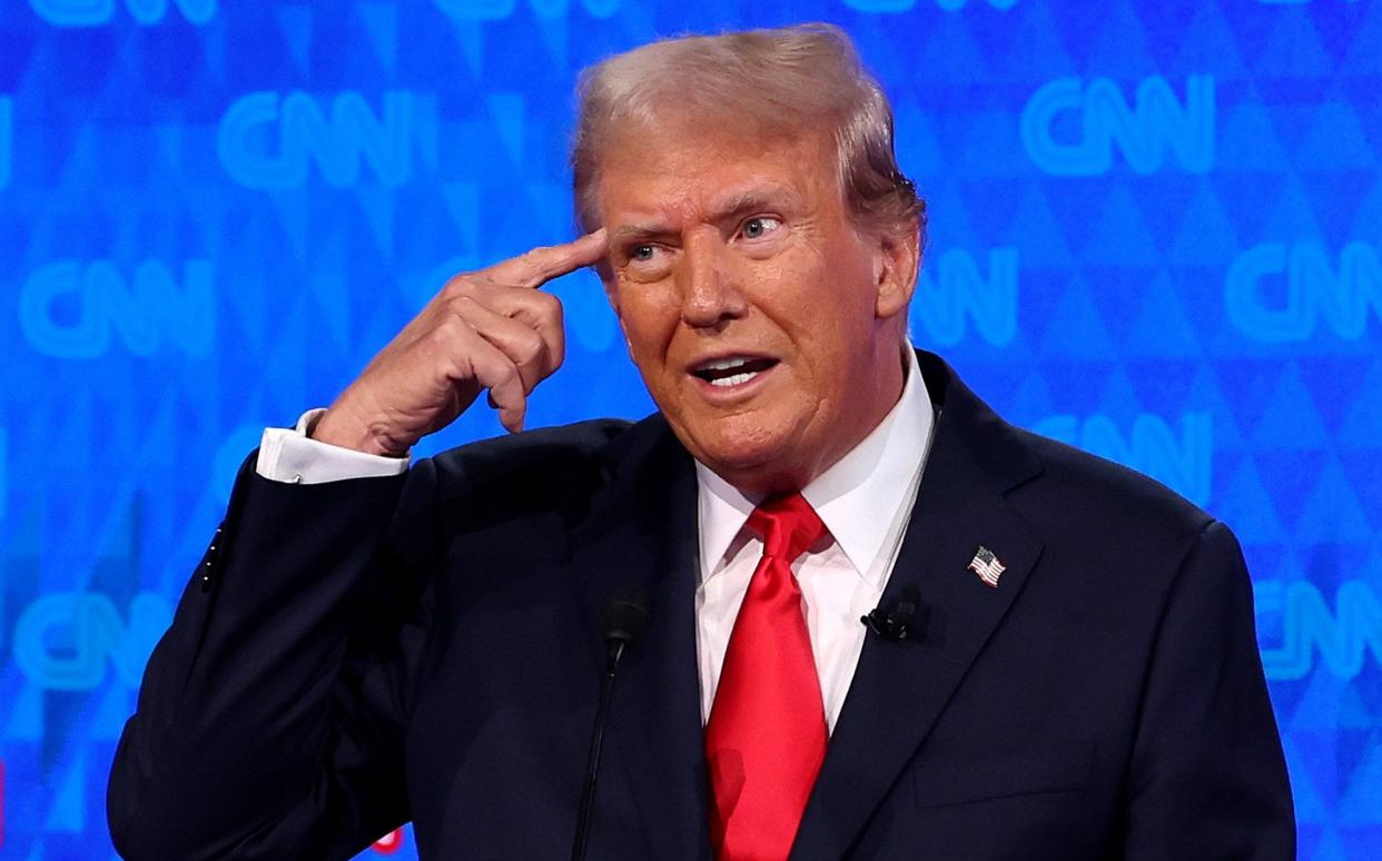 Donald Trump participates in the CNN Presidential Debate in Atlanta, Georgia