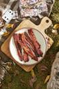 <p>This isn't just bacon—it's bacon done <em>right</em>.</p><p><strong><a href="https://www.countryliving.com/food-drinks/a38531200/brown-sugar-and-rosemary-glazed-bacon-recipe/" rel="nofollow noopener" target="_blank" data-ylk="slk:Get the recipe for Brown Sugar and Rosemary Glazed Bacon" class="link ">Get the recipe for Brown Sugar and Rosemary Glazed Bacon</a>.</strong></p>