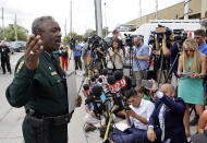 <p>Orange County Sheriff Jerry Demings, left, answers questions at a news conference near the scene of a shooting where there were multiple fatalities in an industrial area near Orlando, Fla., Monday, June 5, 2017. (AP Photo/John Raoux) </p>