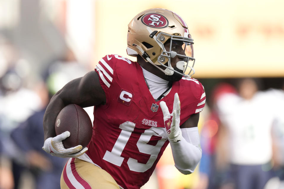 San Francisco 49ers wide receiver Deebo Samuel (19) runs against the Seattle Seahawks during the first half of an NFL football game in Santa Clara, Calif., Sunday, Dec. 10, 2023. (AP Photo/Godofredo A. Vásquez)