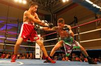 KISSIMMEE, FL - OCTOBER 19: Boxer Orlando Cruz (R) trades punches with boxer Jorge Pazos at Kissimmee Civic Center on October 19, 2012 in Kissimmee, Florida. (Photo by J. Meric/Getty Images)