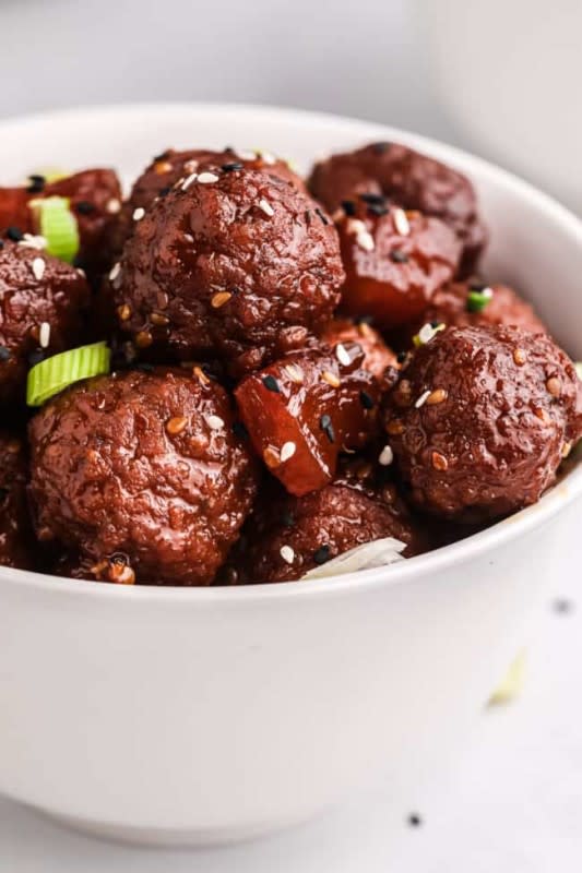 <p>The Cookie Rookie</p><p>Perfect served over steamed white rice with broccoli on the side.</p><p><strong>Get the recipe: <a href="https://www.thecookierookie.com/crockpot-teriyaki-meatballs-recipe/?_gl=1%2Ajswk2j%2A_ga%2AdjVVakNjbFpiUWFPODdRcFd3NnZuX2hZdmpTWW1GNWwwaEwtZ0laUmthdW04Uy1fZ2xGQXpveWtJbWpnYWRfQg.." rel="nofollow noopener" target="_blank" data-ylk="slk:Crock Pot Teriyaki Meatballs;elm:context_link;itc:0;sec:content-canvas" class="link rapid-noclick-resp">Crock Pot Teriyaki Meatballs</a></strong></p>