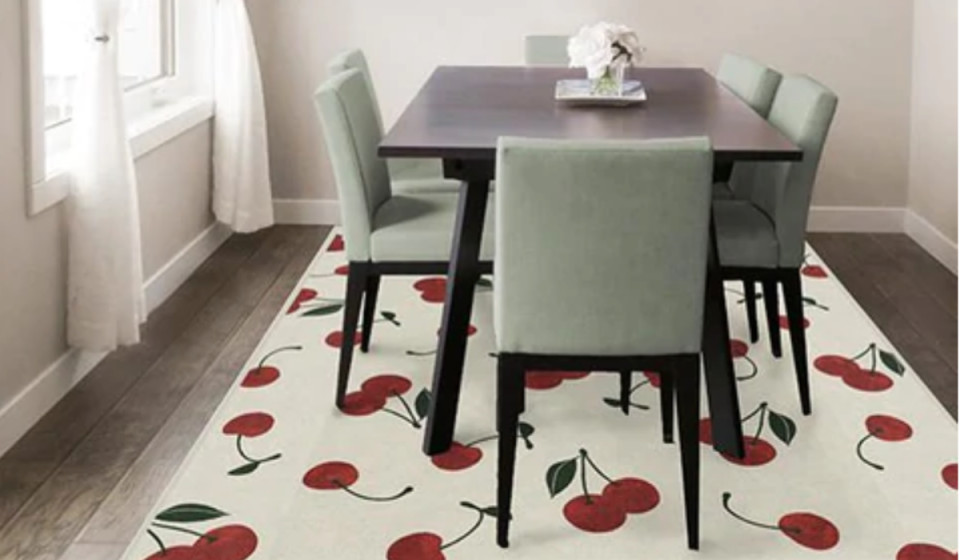 Ruggable's Cherry Red rug in a dining room.