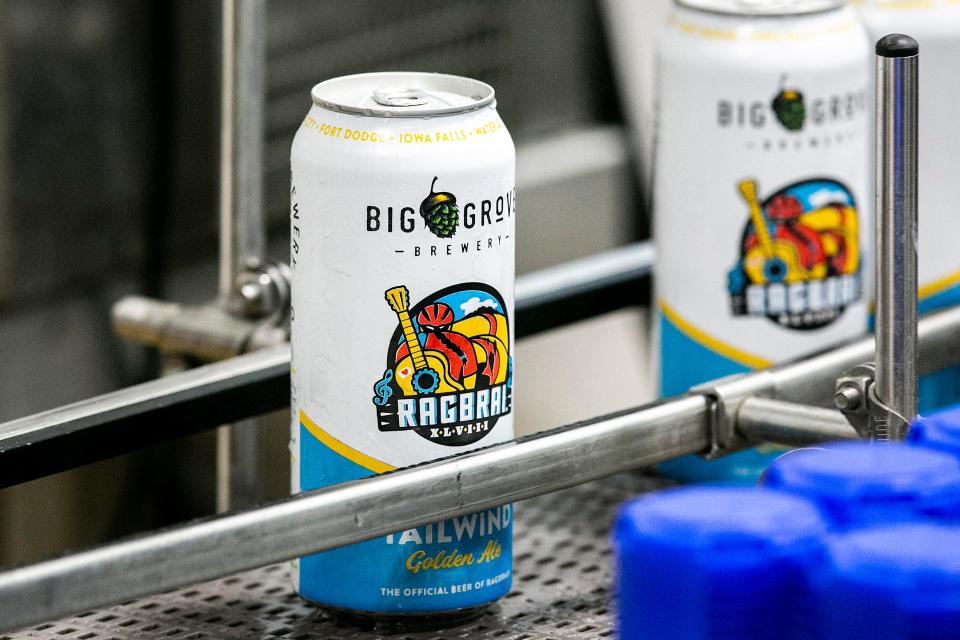 A can of the Tailwind Golden Ale travels down a conveyor belt at Big Grove Brewery & Taproom in Iowa City.