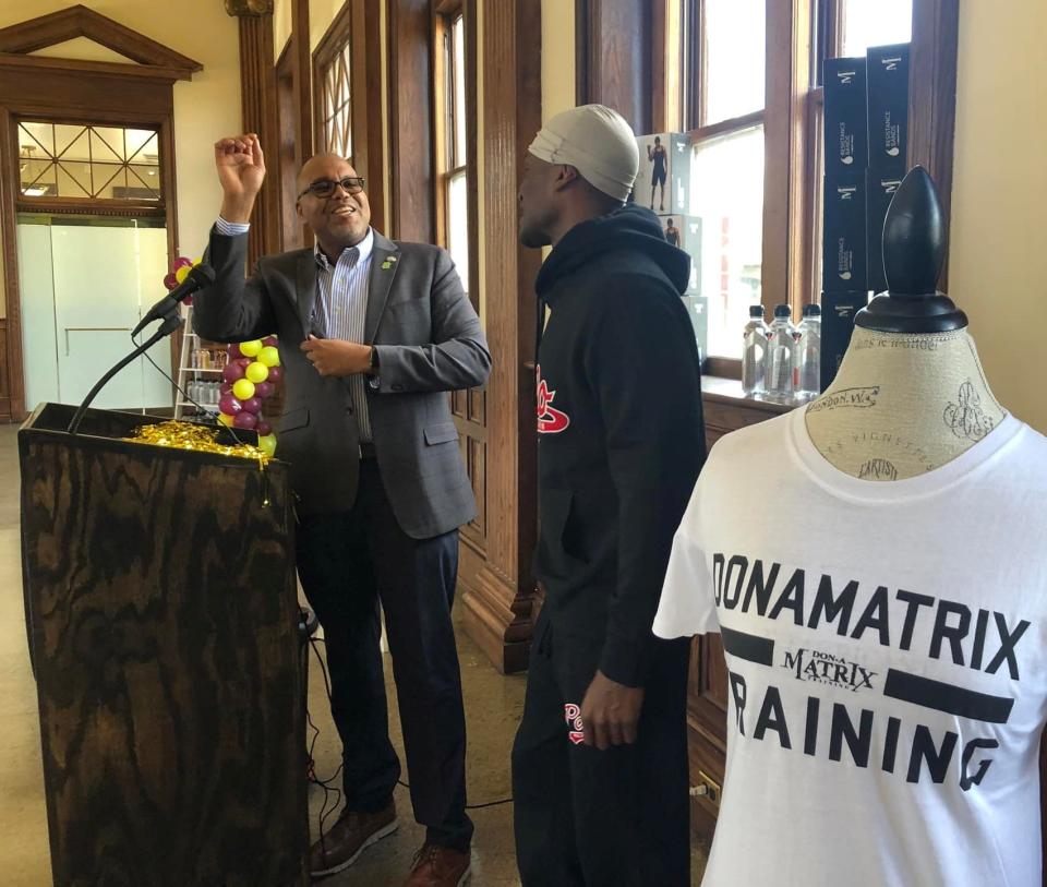 At the 2022 Pre-Donamatrix Day Mix & Mingle at Petersburg Union Station, Samuel Parham, Mayor of Petersburg, thanks Don "DB Donamatrix" Brooks, on the right, for his contributions to Petersburg and its citizens.