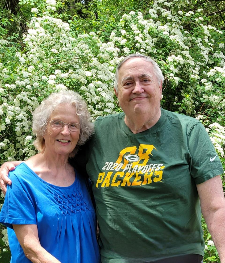 David and Ann Palmer are shown by the bridal bush at Wally and Bee's in Hubertus. After 70 years, the tavern will be permanently closing.