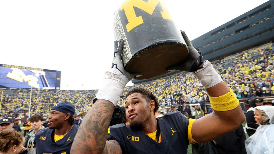 TJ Guy of the Michigan Wolverines celebrates after defeating the Minnesota Golden Gophers. - Gregory Shamus/Getty Images