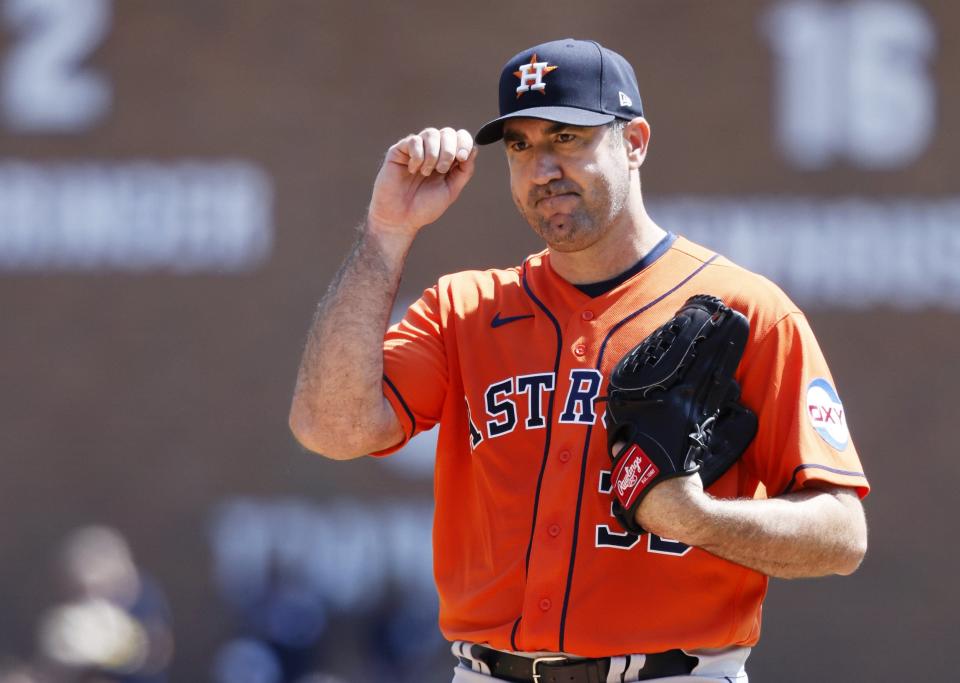 Astros pitcher Justin Verlander acknowledges former teammate Miguel Cabrera during his at-bat in the second inning on Sunday, Aug. 27, 2023, at Comerica Park.