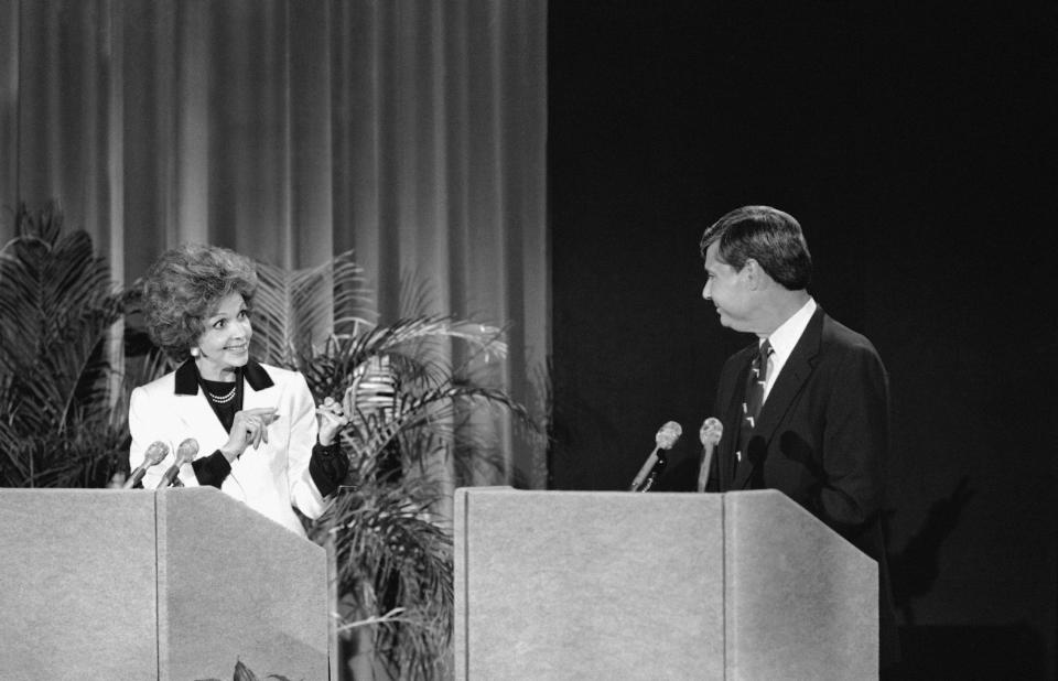 <a href="http://www.senate.gov/artandhistory/history/common/briefing/women_senators.htm"><strong>Served from:</strong></a> 1981-87  Florida Gov. Bob Graham, the Democratic challenger for the state's U.S. Senate seat, listens as incumbent Republican Sen. Paula Hawkins makes a point during their Oct. 20, 1986 debate. (AP Photo/Ray Fairall) 