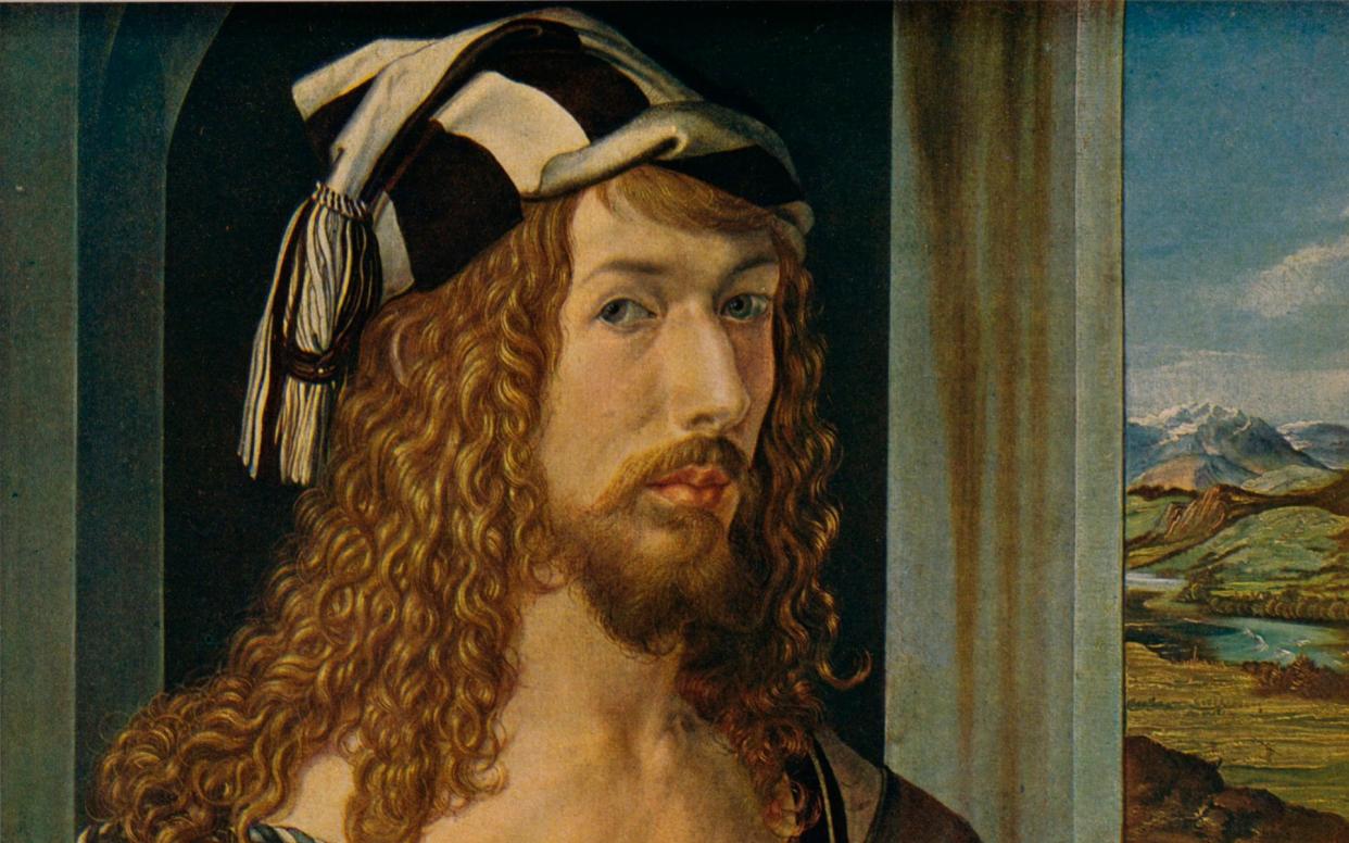 Dürer - seen here in the second of his three self-portraits, painted in 1498 - travelled through Europe in 1520 - The Print Collector/Getty