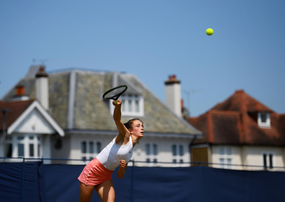 <p>SURBITON, ENGLAND - JUNE 01: Isabelle Lacy serves during her singles match against Hannah Read in the Junior National Tennis Championships at Surbiton Racket & Fitness Club on June 01, 2021 in Surbiton, England. (Photo by Alex Davidson/Getty Images for LTA)</p>
