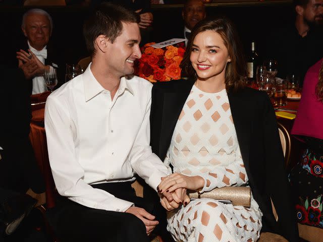 <p>Michael Kovac/WireImage</p> Evan Spiegel (L) and model Miranda Kerr attend the 2016 Pre-GRAMMY Gala