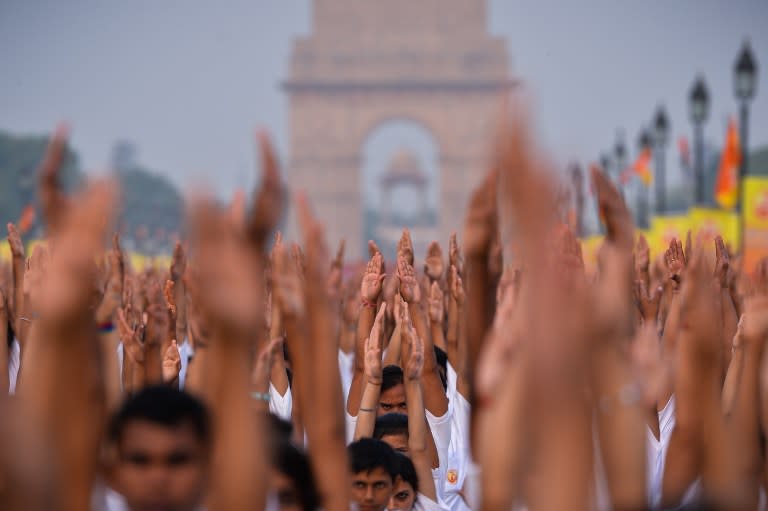 <p>Indian yoga practitioners participate in a rehearsal for International Yoga Day on Rajpath in New Delhi on June 19, 2016. The ancient Indian practice of yoga is celebrated every year on June 21 as International Day of Yoga. </p>