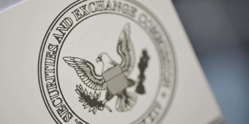 FILE PHOTO: The U.S. Securities and Exchange Commission logo adorns an office door at the SEC headquarters in Washington, June 24, 2011.  REUTERS/Jonathan Ernst