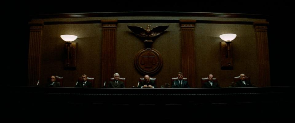 The nearly faceless senate ruling on assassinations in the paranoid thriller The Parallax View.