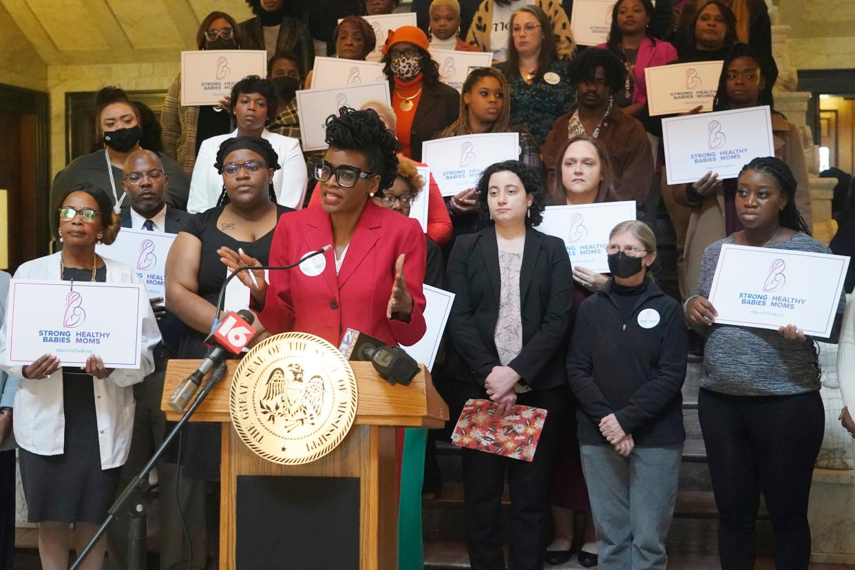 Cassandra Welchlin, executive director of the Mississippi Black Women's Roundtable, addresses reporters during a news conference by the group, during which they presented their legislative agenda which included extending postpartum coverage for Medicaid recipients up from the current 60-day window to 12 months, Thursday, Jan. 26, 2023, at the Mississippi Capitol in Jackson.