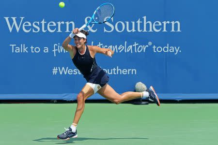 Aug 19, 2017; Mason, OH, USA; Garbine Muguruza (ESP) serves against Karolina Pliskova (CZE) during the Western and Southern Open at the Lindner Family Tennis Center. Mandatory Credit: Aaron Doster-USA TODAY Sports