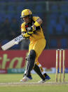 Peshawar Zalmi's Kamran Akmal bats during the Pakistan Super League T20 cricket match between Quetta Gladiators and Peshawar Zalmi at National stadium in Karachi, Pakistan, Saturday, Feb. 22, 2020. (AP Photo/Fareed Khan)