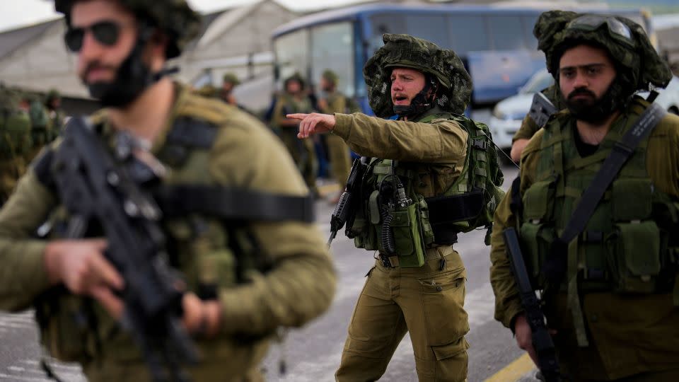 Israeli soldiers patrol a road near the border with Lebanon, on Monday, amid threat of a regional conflict between Israel and Iran-backed Hezbollah.  - Francisco Seco/AP