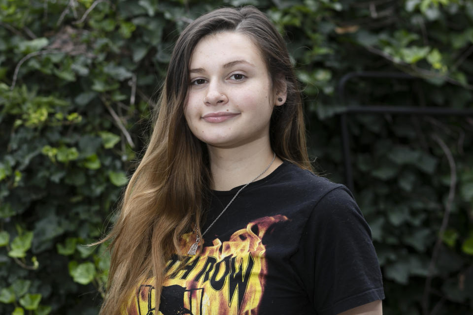 Kara Apuzzo poses for a portrait Thursday, Aug. 13, 2020, in New Haven, Conn. Educational disruptions forced by the coronavirus pandemic are hurting teenagers who also may need to work and help their families care for young kids. (AP Photo/Frank Franklin II)