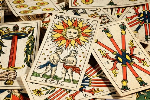 <span class="caption">Tarot readers have been cast as swindlers and diviners of the future. The history of the cards suggests they are much more. </span> <span class="attribution"><a class="link " href="https://www.shutterstock.com/image-photo/set-old-tarot-cards-lying-scattered-181452113" rel="nofollow noopener" target="_blank" data-ylk="slk:Photology1971/Shutterstock;elm:context_link;itc:0;sec:content-canvas">Photology1971/Shutterstock</a></span>