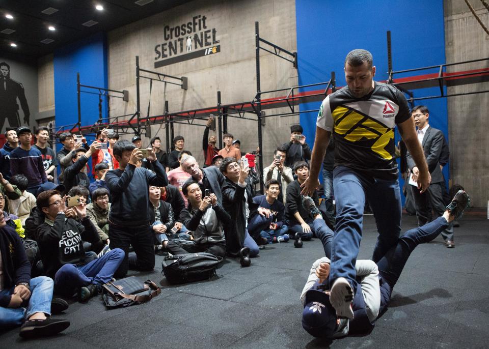 SEOUL, SOUTH KOREA - OCTOBER 29:  Mauricio Rua demonstrates a martial arts technique with a fan during a fan meeting at Reebok Crossfit Sentinel Gym Uptown on October 29, 2015 in Seoul, South Korea.  (Photo by Christopher Jue /Zuffa LLC/Zuffa LLC via Getty Images)