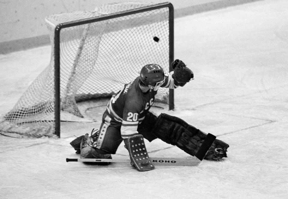 FILE - In this 1980 file photo, Soviet goalie Vladislav Tretiak allows a goal by the U.S. team in the first period of a medal-round hockey game at the 1980 Winter Olympics in Lake Placid, New York. Tretiak said the U.S. hockey team taught the Soviets a "good lesson" about respecting competitors by beating them in the 1980 Olympics. Tretiak, the three-time Olympic gold medalist, gave up two goals in the first period of the "Miracle on Ice" at the 1980 Lake Placid Olympics and then was benched in what is widely regarded as the greatest upset in Olympic history. (AP Photo, File)