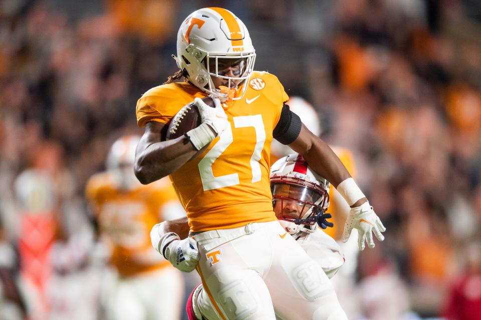 Tennessee running back Len'Neth Whitehead (27) runs the ball during a football game against South Alabama at Neyland Stadium in Knoxville, Tenn. on Saturday, Nov. 20, 2021.