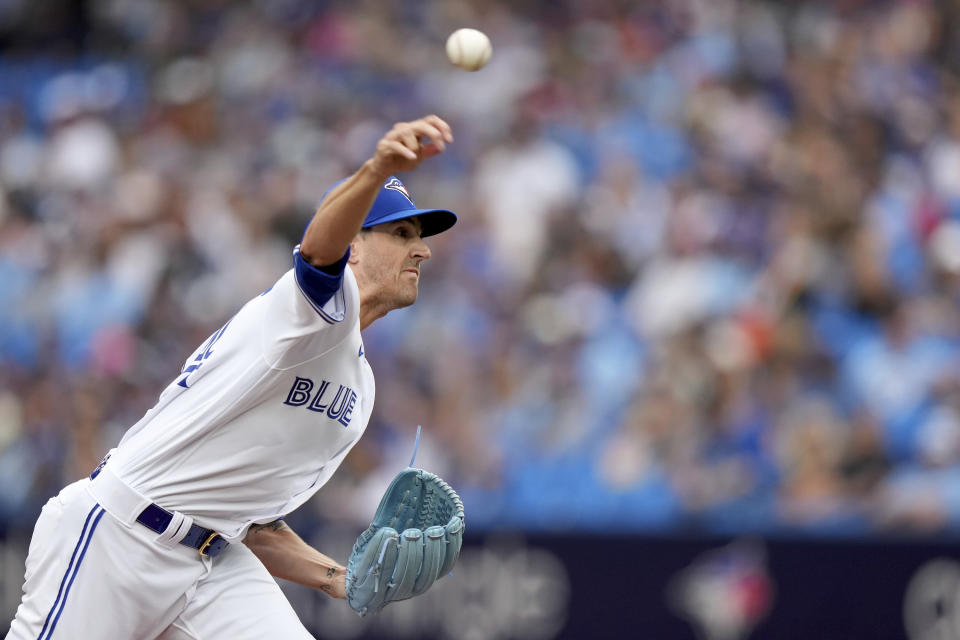 Toronto Blue Jays starting pitcher Kevin Gausman (34) works against the Kansas City Royals during the first inning of a baseball game in Toronto, Saturday, Sept. 9, 2023. (Nathan Denette/The Canadian Press via AP)