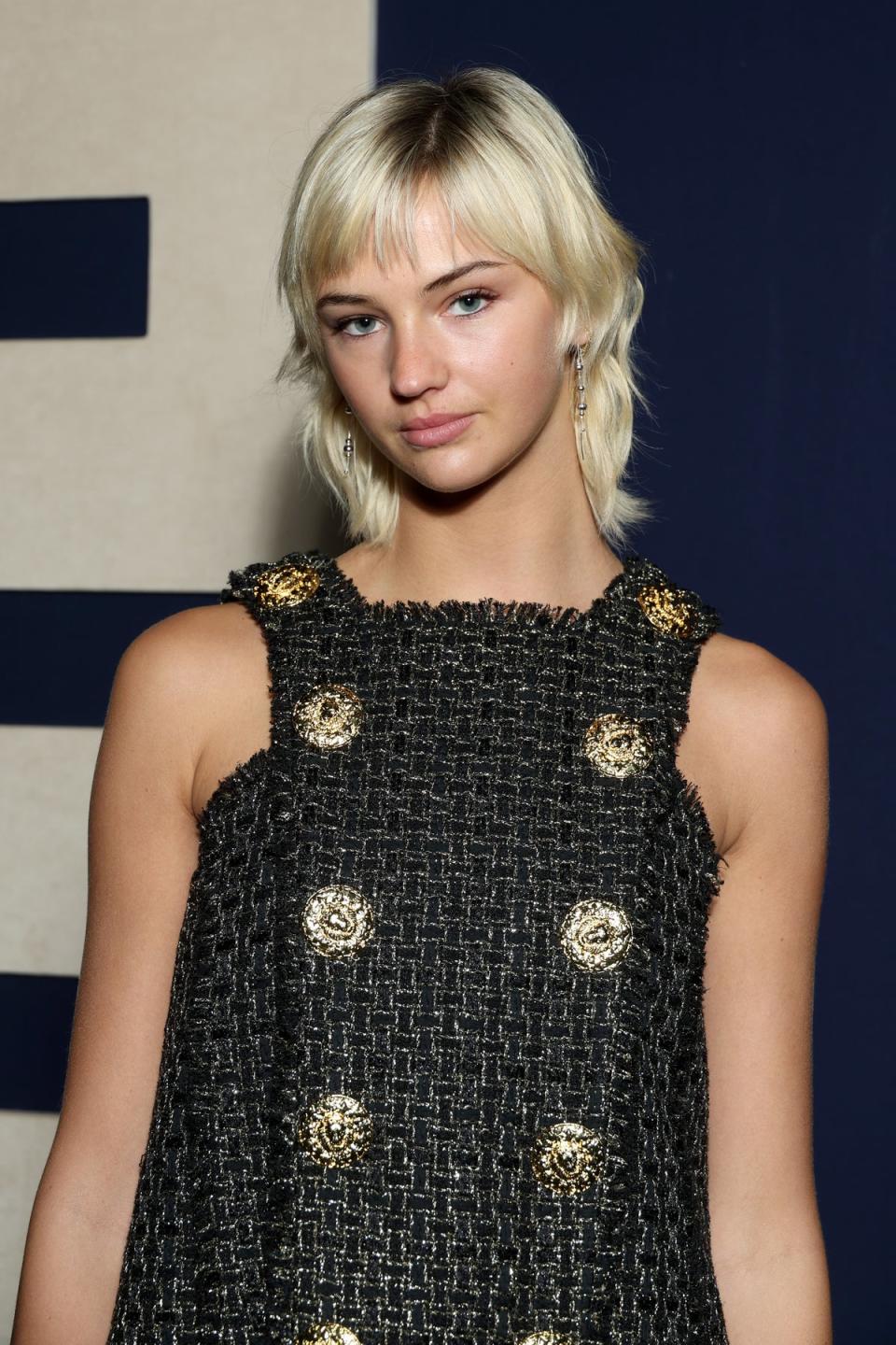 Harriet Muldoon client Mia Regan has a chic mixie cut and Barbie fringe (Pascal Le Segretain / Getty Images for Balmain)