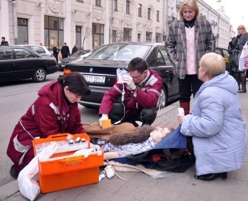 Doctors help a man injured in a bomb blast at a metro station in downtown Minsk in 2011. Belarus has executed both men convicted of a Minsk metro bombing that killed 15 people in the nation's worst attack since its post-Soviet independence, state television reported on Sunday