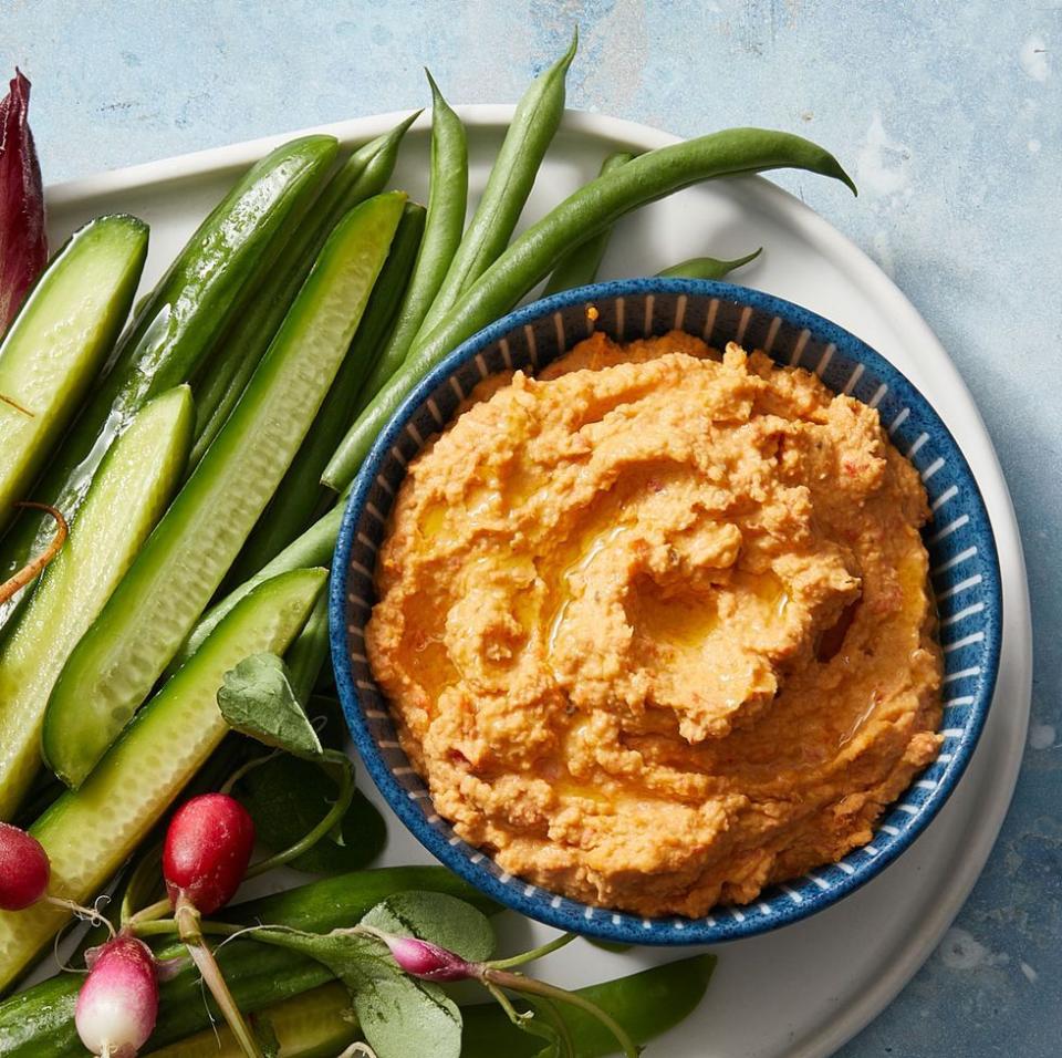 <p>Give your go-to hummus recipe a bright boost with homemade roasted red peppers, plus a little paprika for even more color.</p><p><em><a href="https://www.goodhousekeeping.com/food-recipes/easy/a30473519/roasted-red-pepper-hummus-recipe/" rel="nofollow noopener" target="_blank" data-ylk="slk:Get the recipe for Roasted Red Pepper Hummus »;elm:context_link;itc:0;sec:content-canvas" class="link ">Get the recipe for Roasted Red Pepper Hummus »</a></em></p>