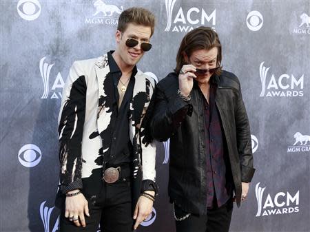 Brian Kelley (L) and Tyler Hubbard of the band Florida Georgia Line arrive at the 49th Annual Academy of Country Music Awards in Las Vegas, Nevada April 6, 2014. REUTERS/Steve Marcus