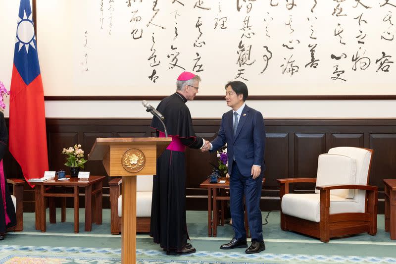 Taiwan's new President Lai Ching-te meets Archbishop Charles John Brown, the Vatican's ambassador to the Philippines, in Taipei