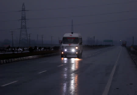 An ambulance moves near the site of explosion in Lethpora in south Kashmir's Pulwama district February 14, 2019. REUTERS/Danish Ismail