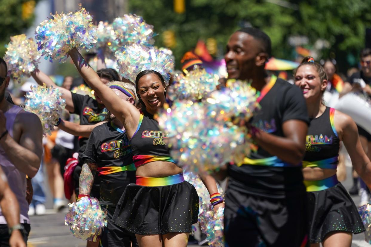 Revelers march down Fifth Avenue during the annual NYC Pride March, Sunday, June 26, 2022, in New York. 