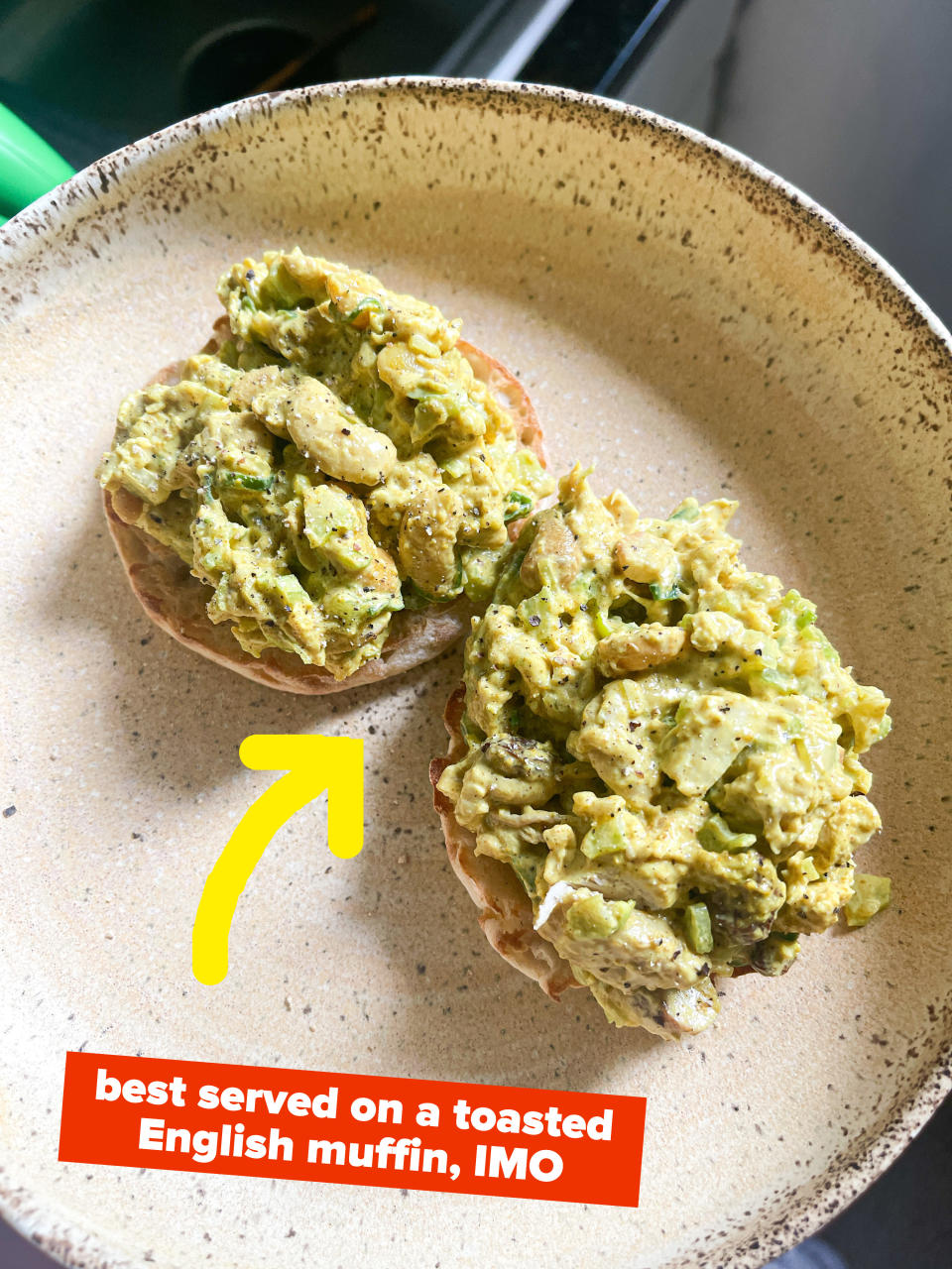 Curried chicken salad on top of toasted English muffins